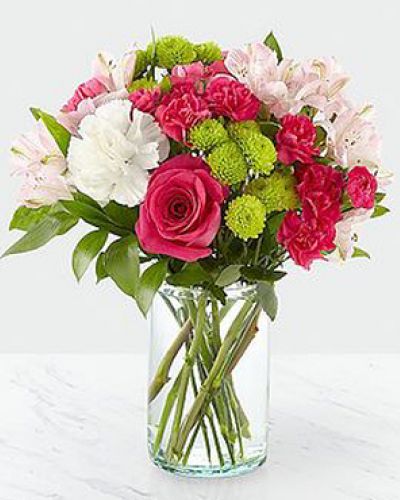 The true beauty of this bouquet is within the sweet colors of the flowers. An array of hot pink roses, pale pink alstroemeria and more are set in a glass cylinder vase, making a wonderful gift to light up the face of its recipient. GOOD bouquet 14H x 14W.
STANDARD
C Quantity Color Description
2 Hot Pink 50 cm Standard Rose
2 Pink Alstroemeria
3 White Standard Carnation
2 Green Button Pom
2 Hot Pink Miniature Carnation
2 Green Green - Israeli Ruscus
DELUXE
C Quantity Color Description
4 Hot Pink 50 cm Standard Rose
4 Pink Alstroemeria
4 White Standard Carnation
3 Green Button Pom
4 Hot Pink Miniature Carnation
2 Green Green - Israeli Ruscus
PREMIUM
C Quantity Color Description
8 Hot Pink 50 cm Standard Rose
5 Pink Alstroemeria
6 White Standard Carnation
4 Green Button Pom
5 Hot Pink Miniature Carnation
2 Green Green - Israeli Ruscus