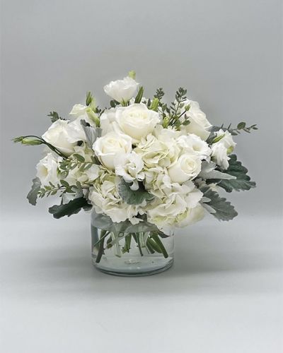 If you're looking for the perfect gift in a dazzling array of white flowers, then look no further as this arrangement is guaranteed to turn heads and make your recipient smile.