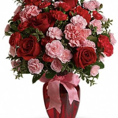 <div class="m-pdp-tabs-description">
<div id="mark-2" class="m-pdp-tabs-marketing-description">True romance will bloom brighter than ever when you surprise her with this dazzling bouquet of red roses, red carnations and other favorites in a chic ruby red vase. "Surprise" is the key word. That's when flowers mean the most.</div>
</div>
<p id="arrngDescp">This gorgeous bouquet includes red roses, red carnations, light pink carnations, red miniature carnations, light pink miniature carnations and green rhamnus accented with assorted greenery and a pink satin ribbon. Delivered in a ruby rose vase.</p>