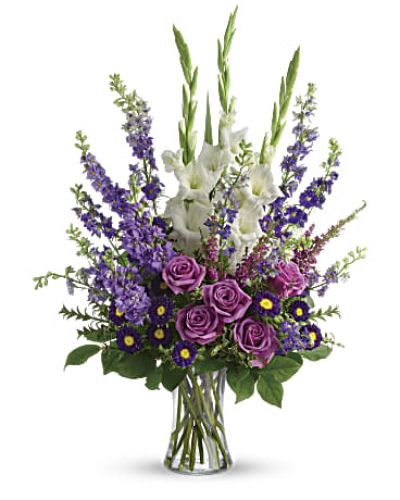 <div class="m-pdp-tabs-description">
<div id="mark-1" class="m-pdp-tabs-marketing-description">Lavender and white flowers make a grand statement in this bouquet. Cherish your memories with this display of lavender larkspur and roses, deep purple asters, pure white gladioli and the softest pink heather.</div>
</div>