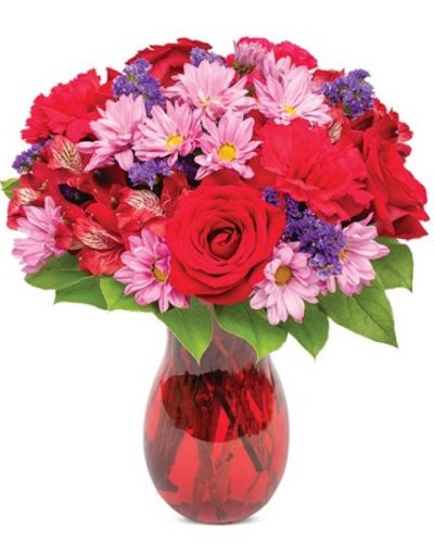 <p>Nothing short of absolute bliss- that's the feeling you'll stir as your very special someone beholds this glorious blending of roses, alstroemeria, statice and spray daisies in a red swirl vase.</p>