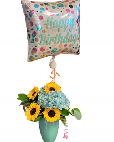 Add celebration and good vibes to their special day with the Birthday Vibes arrangement. Cheery sunflowers combine with gorgeous hydrangeas and a mylar balloon to create the perfect way to say “Happy Birthday!” Happiness delivered.